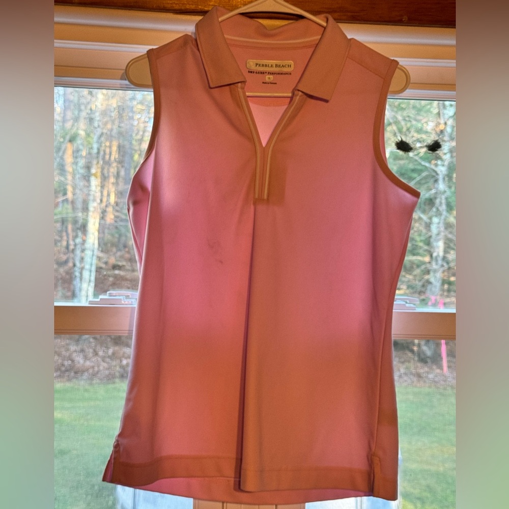 Pink sleeveless golf top
